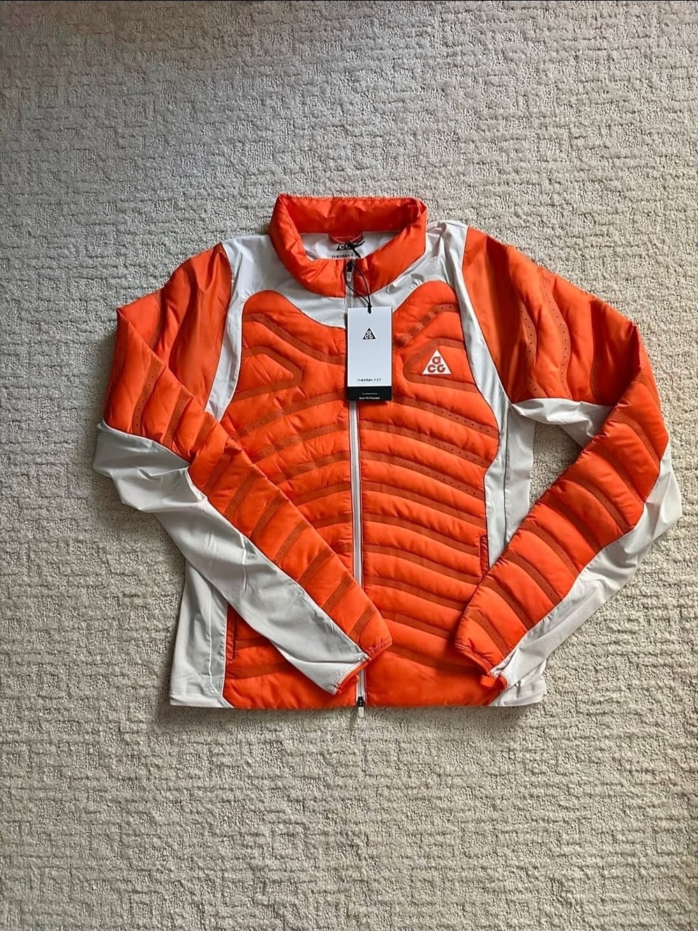 Nike ACG Women’s Orange and Cream Quilted Puffer Jacket